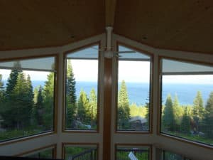 Kempler Design in Reno NV helped this client provide motorized roller shades for their Lake Tahoe home. They were provided with a creative solution for their angle top windows.